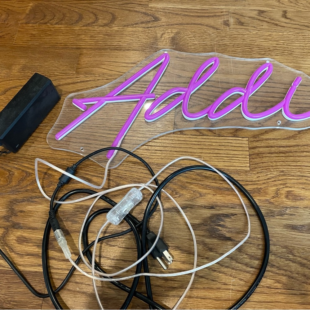 Addi purple neon sign